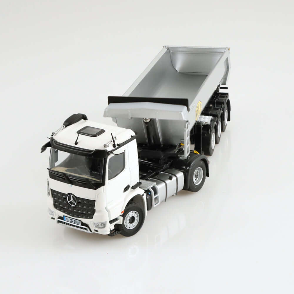Mercedes-Benz Arocs Meiller tipping semi trailer.