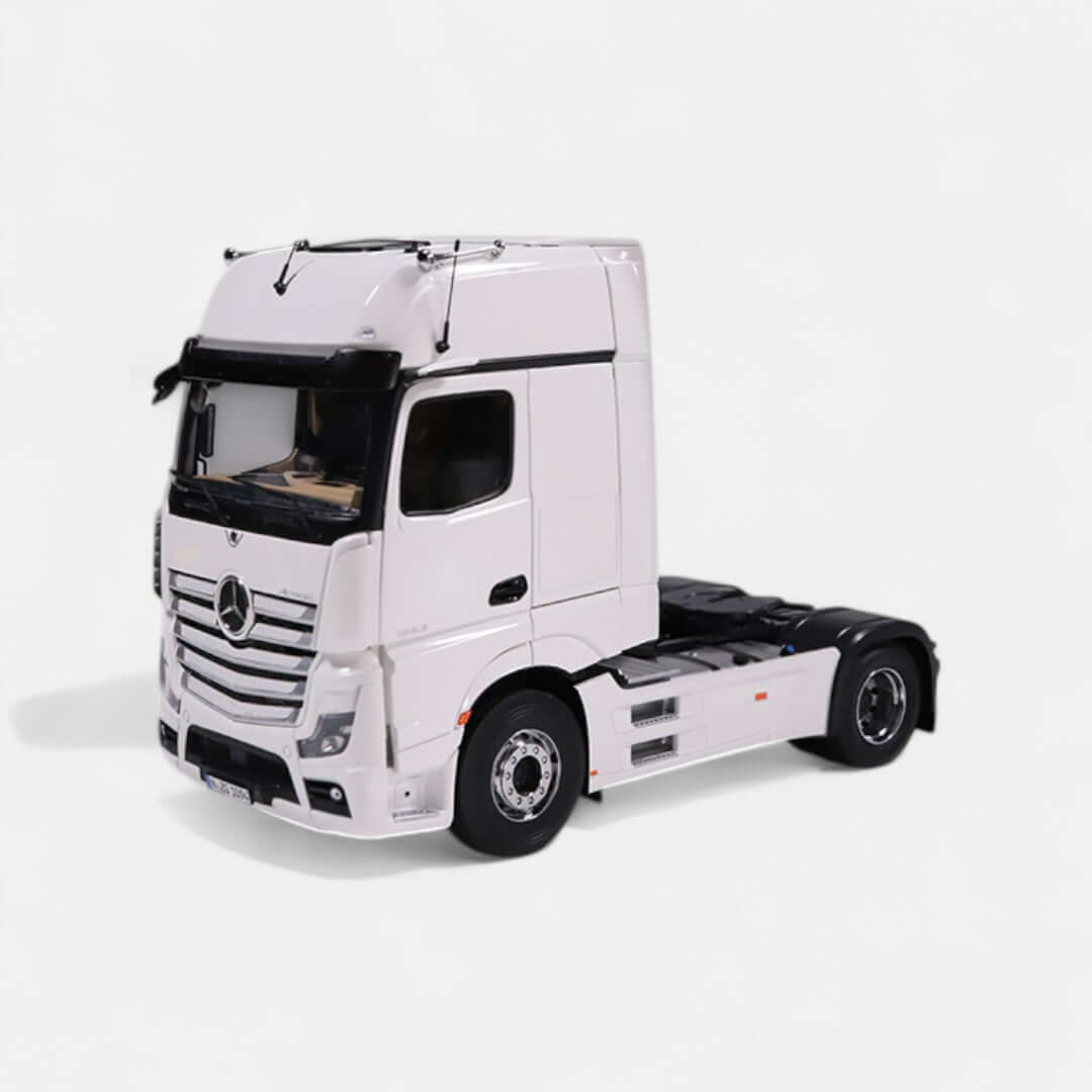 Mercedes-Benz Actros L scale model in white, featuring detailed exterior and interior design.