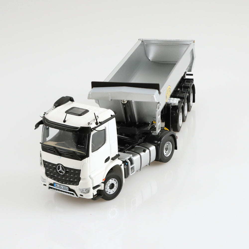 Mercedes-Benz Arocs Meiller tipping semi trailer.