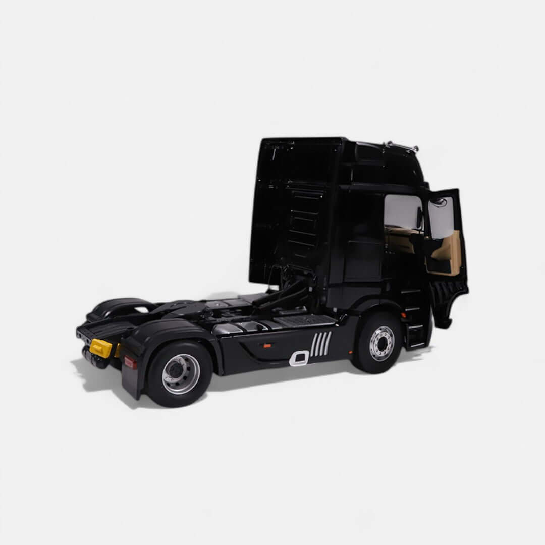 Mercedes-Benz Actros L 1:18 scale model, black truck with detailed exterior and cabin design.
